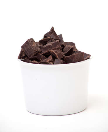 delicious close-up of chocolate in a white dish over whiteの写真素材