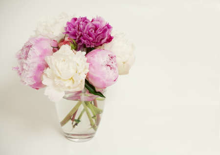 bunch of peony in a glassの写真素材