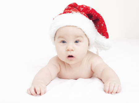 sweet baby in Santa's hat