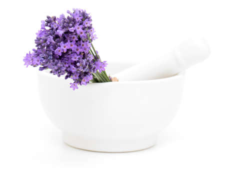 Mortar and a bouquet of lavender isolated on white backgroundの写真素材