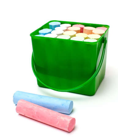 chalks in a variety of colors on a white background