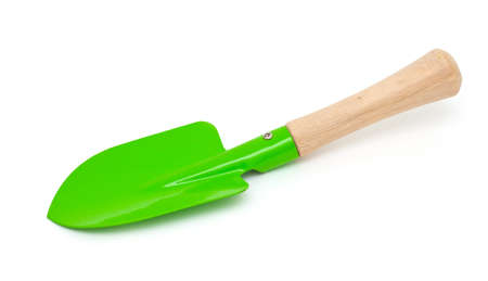 green garden shovel isolated on white backgroundの写真素材