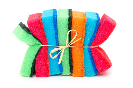 tied up colorful sponges on white backgroundの写真素材