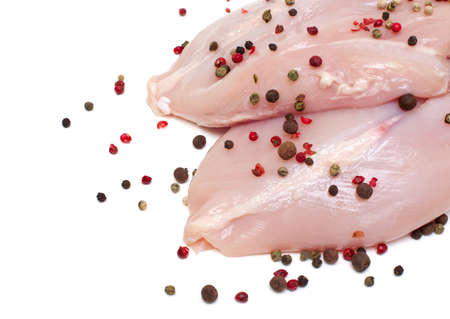 fresh raw chicken breast isolated on whiteの写真素材