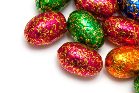 wrapped chocolate eggs and copy space for your textの写真素材