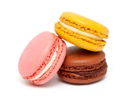 colorful macarons isolated on white backrgoundの写真素材
