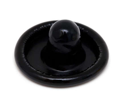 black condom isolated on white background