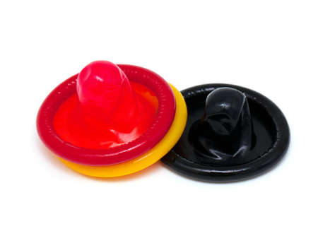 colorful condoms isolated on white backgroundの写真素材