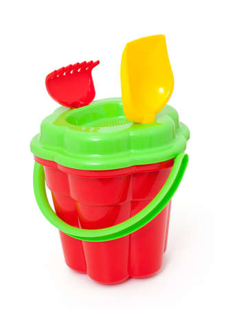 play set with bucket, shovel and rake on whiteの写真素材
