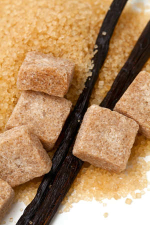 vanilla beans and brown vanilla sugar isolated on white backgroundの写真素材