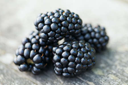 blackberries on wooden backgroundの写真素材