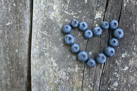 blueberry on wooden backgroundの写真素材