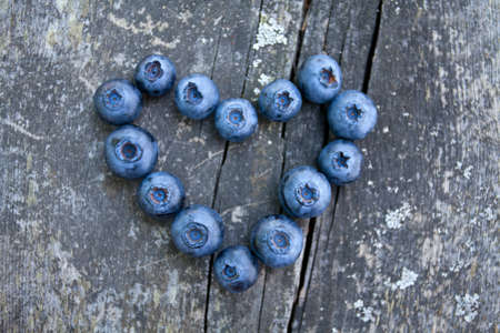 blueberry on wooden backgroundの写真素材