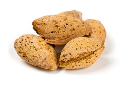 fresh almonds isolated on white backgroundの写真素材