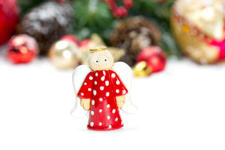 cute angel against Christmas decorationの写真素材