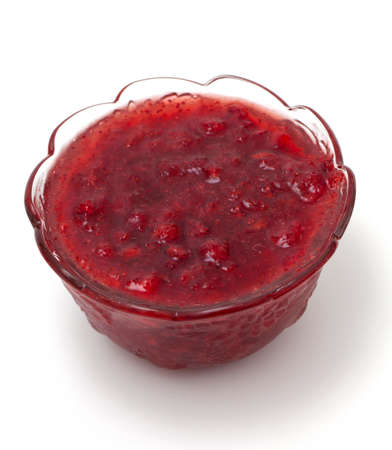 wild strawberry jam isolated on whiteの写真素材