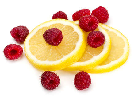 raspberry and lemon isolated on whiteの写真素材