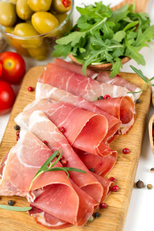 sliced prosciutto and vegetablesの写真素材