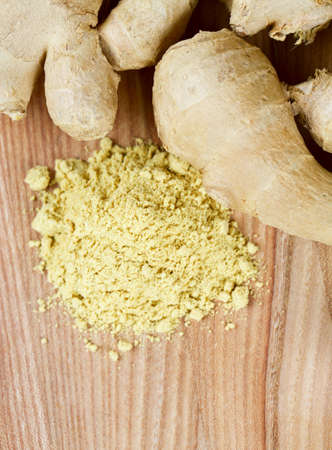 dried ginger on wooden surfaceの写真素材