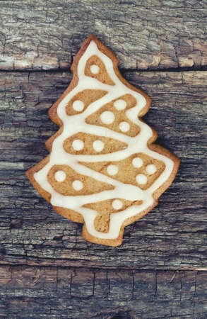 Christmas gingerbread tree on wooden surfaceの写真素材
