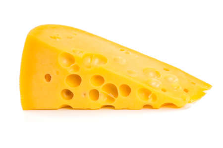 piece of cheese isolated on a white の写真素材