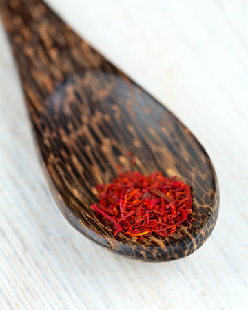 pile of saffron on wooden wurfaceの写真素材