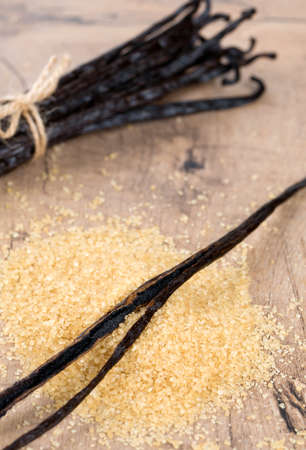 vanilla pods and brown cane sugarの写真素材