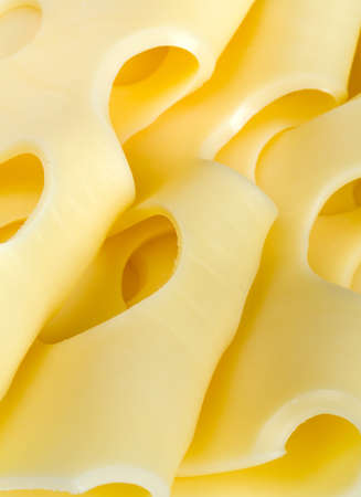 fresh sliced cheese isolated on white backgroundの写真素材