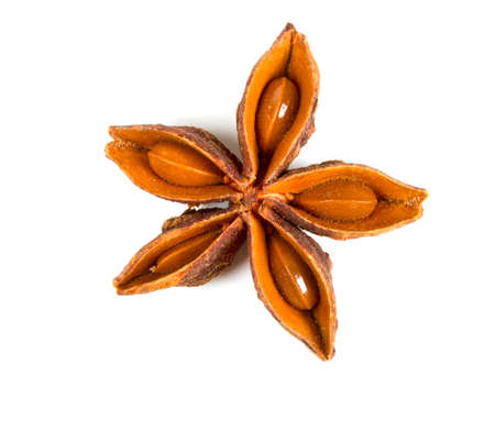 star anise isolated on whiteの写真素材