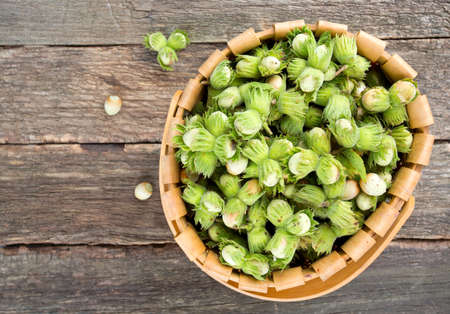 hazelnuts in a basketの写真素材