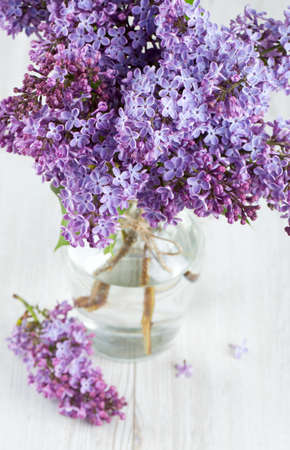 beautiful lilac on white wooden surfaceの写真素材