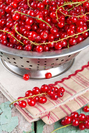 red currant on wooden surfaceの写真素材