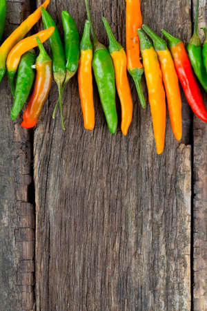 hot pepper on wooden surface