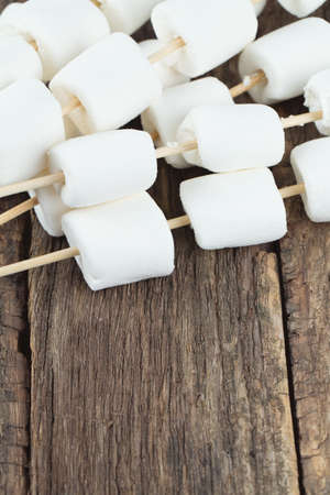 marshmallow ready to be cooked on bbqの写真素材