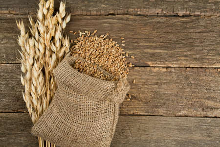 oats on wooden surfaceの写真素材