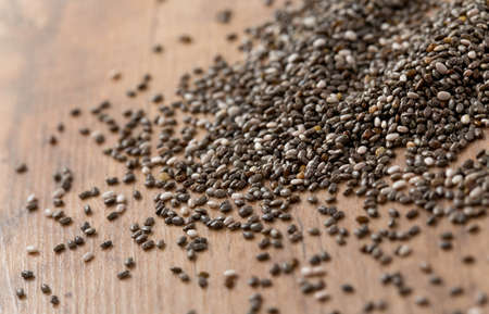chia seeds on wooden surfaceの写真素材