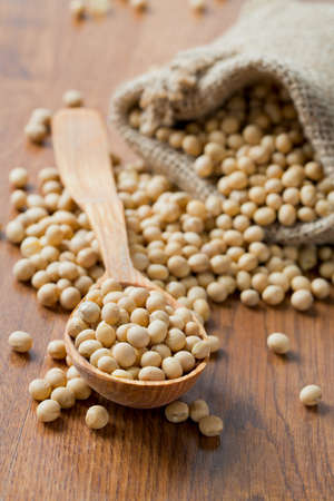 soya beans on wooden surfaceの写真素材