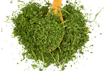 dried parsley isolated on whiteの写真素材