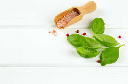 fresh basil leaves on wooden surfaceの写真素材