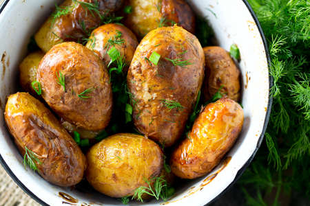 roasted new potatoes with dill and spring onionsの写真素材