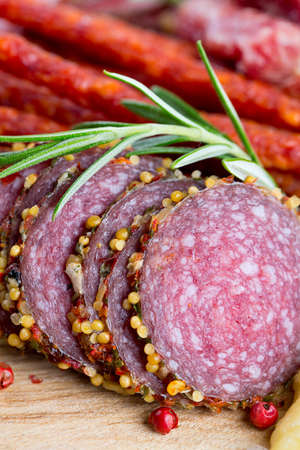 smoked salami, sausages, proschiutto and cheeseの写真素材