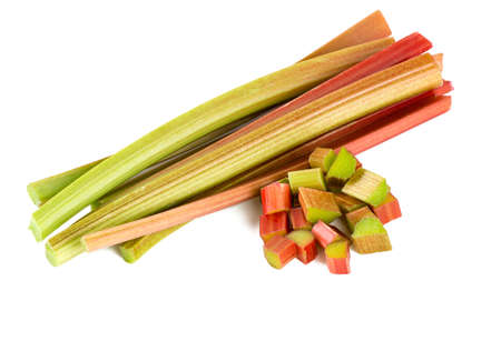 freshly cut pieces of rhubarb isolated on white backgroundの写真素材