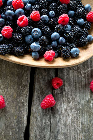 forest berres in a wooden bowl