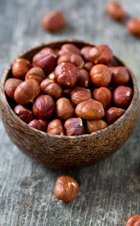 hazelnuts in a wooden bowl
