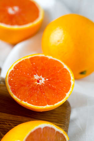 red oranges on wooden surfaceの写真素材