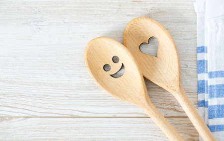 smiling spoons and kitchen towel