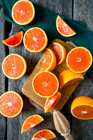 red oranges on wooden surfaceの写真素材