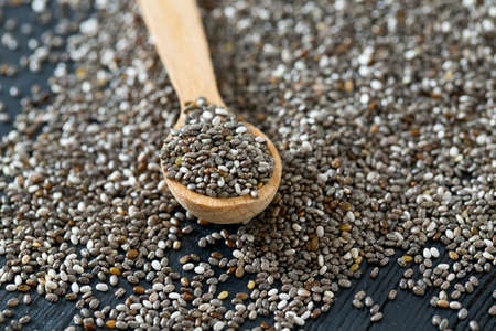 chia seeds onw ooden surfaceの写真素材