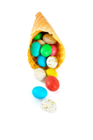 chocolate eggs in waffle cone isolated on white