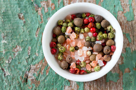 pepper and salt in a bowlの写真素材